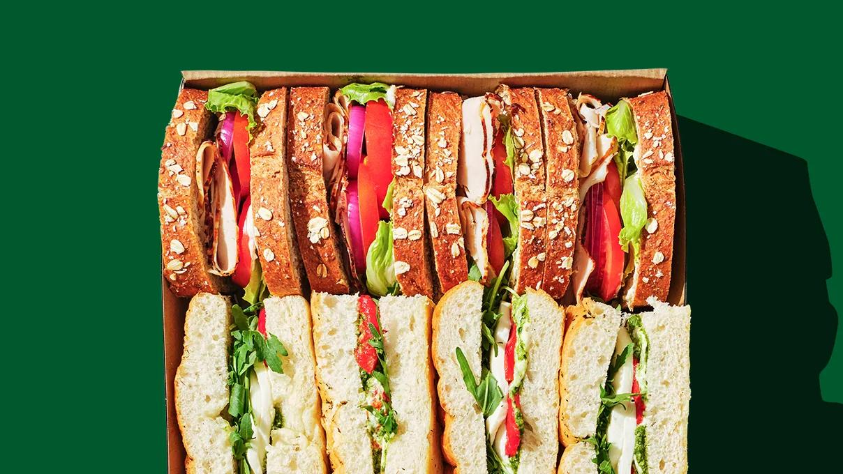 A box of freshly cut sandwiches